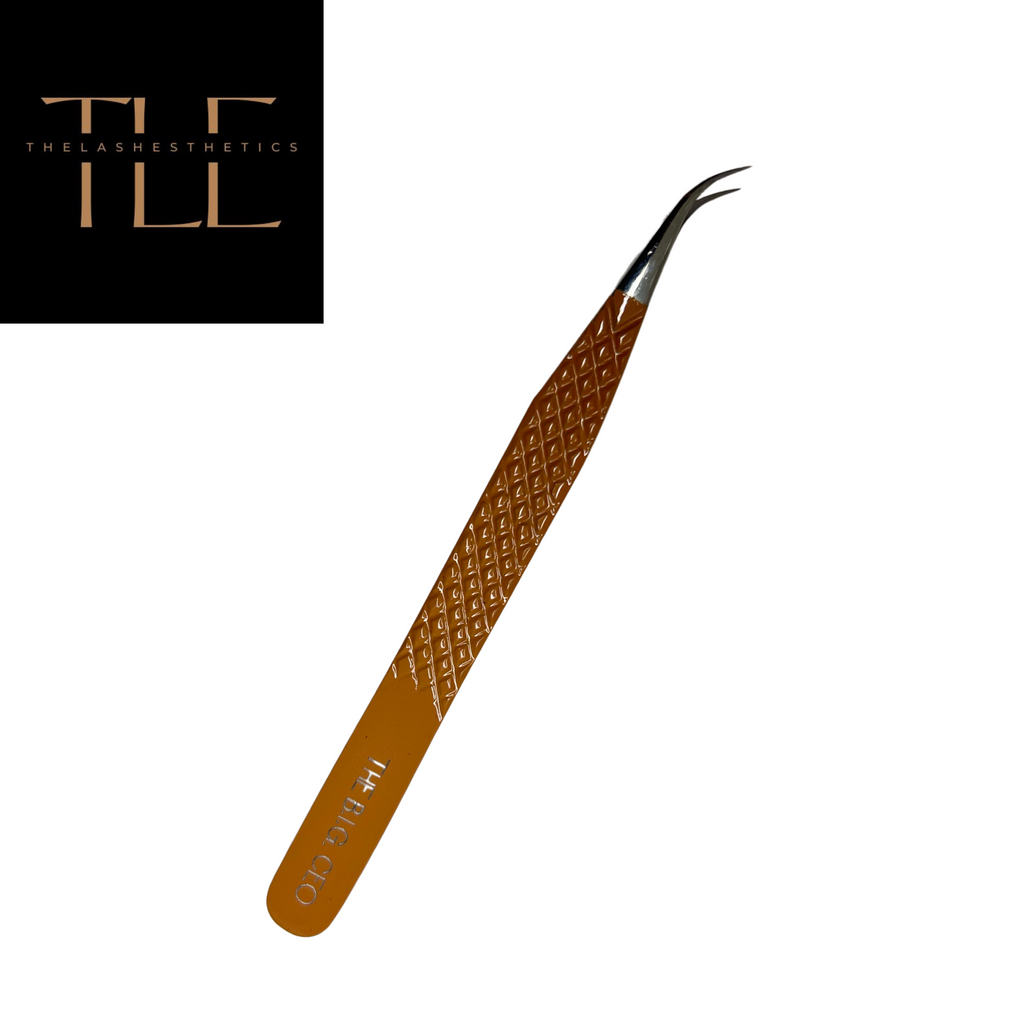 Professional isolation tweezers in hand demonstrating ergonomic grip